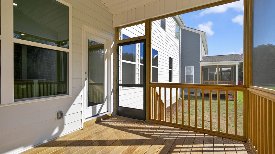 covered and screened back deck