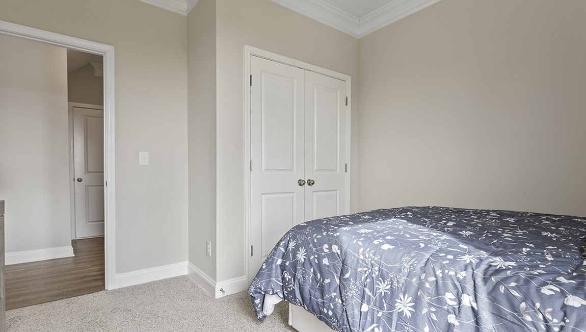 Bedroom with carpet flooring