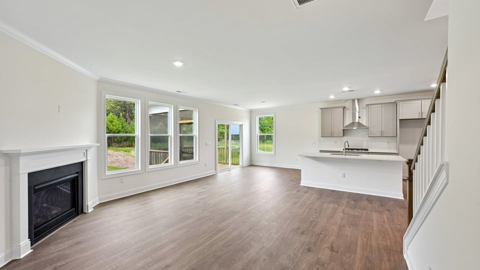 open concept living area with fireplace