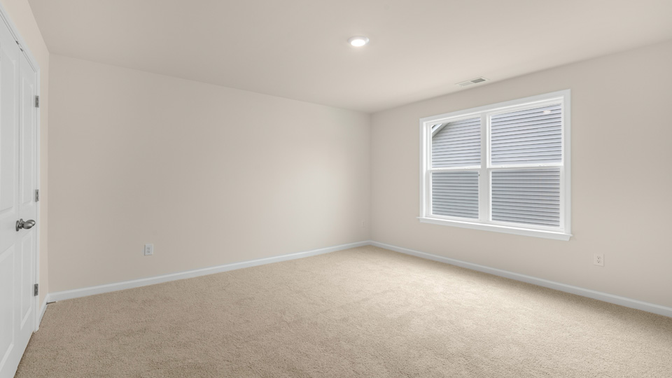Bedroom with carpet