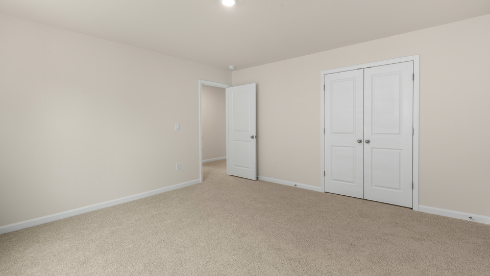 Bedroom with carpet