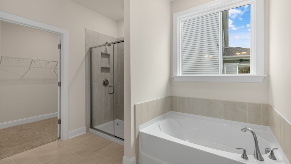 Bathroom with separate tub and walk-in shower