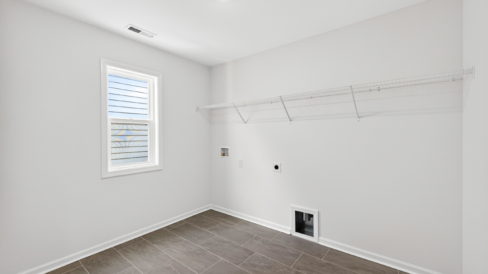 laundry room with wire shelving