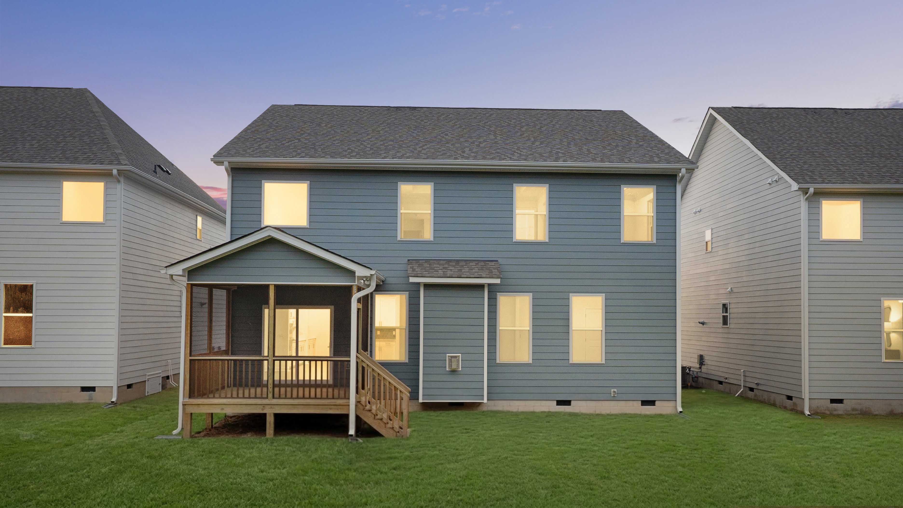 hampshire back yard with covered patio twilight exterior