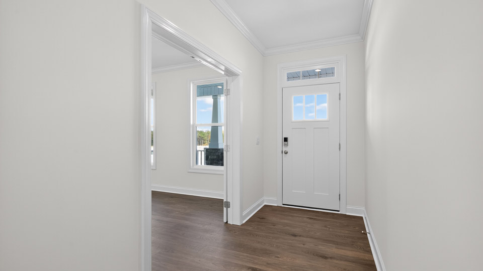 foyer entryway with revwood flooring
