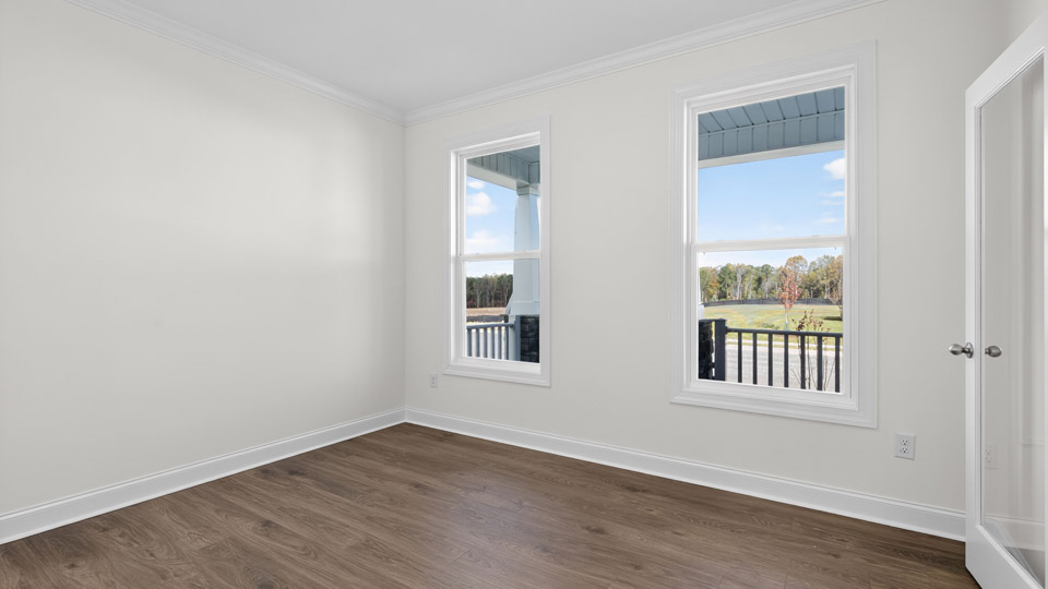 study with revwood flooring and french doors