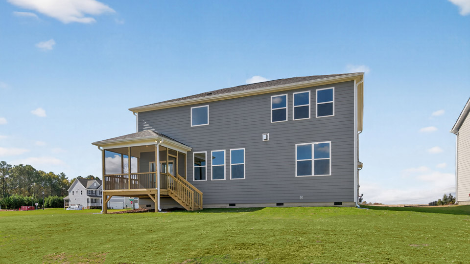 jordan backyard with covered and screened in back deck