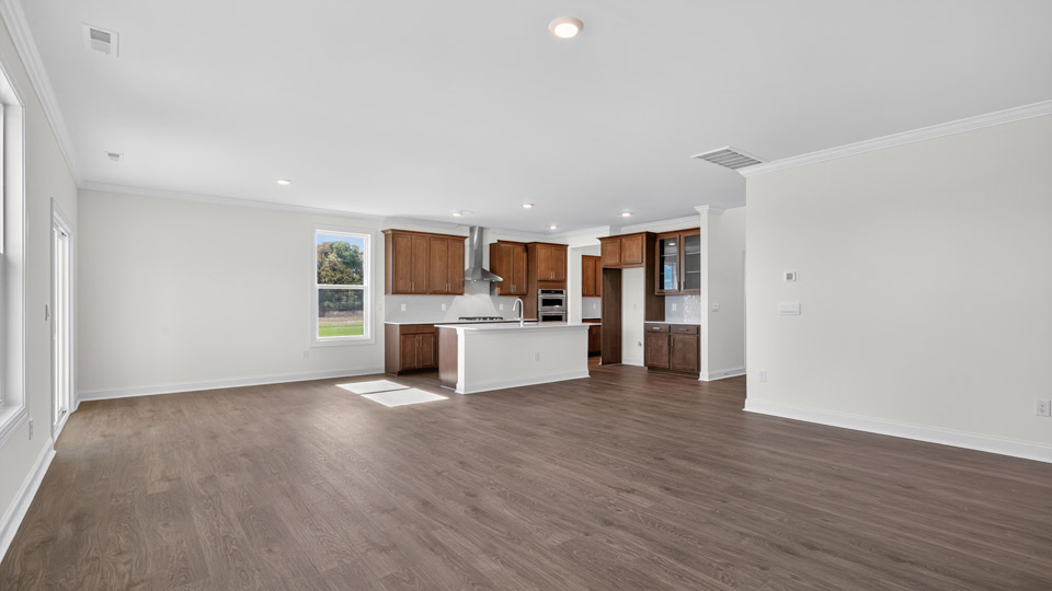 kitchen overlooking living room with revwood flooring