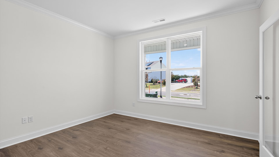 study with revwood flooring and french doors