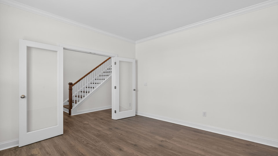 study with revwood flooring and french doors