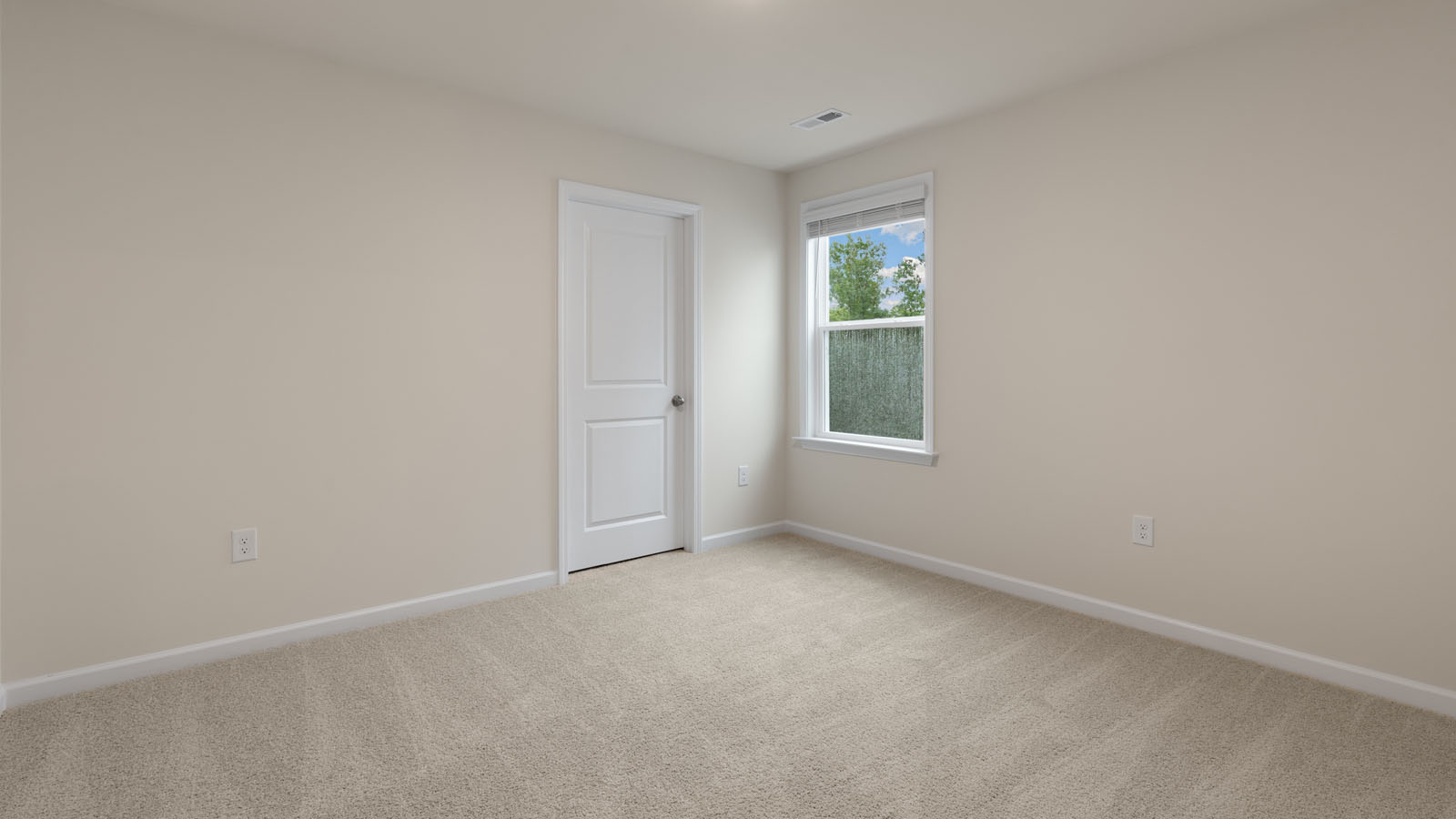 Bedroom with carpet flooring