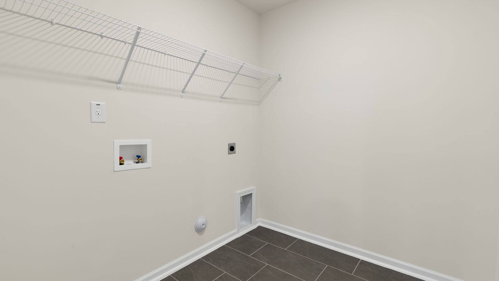 Laundry room with vinyl flooring