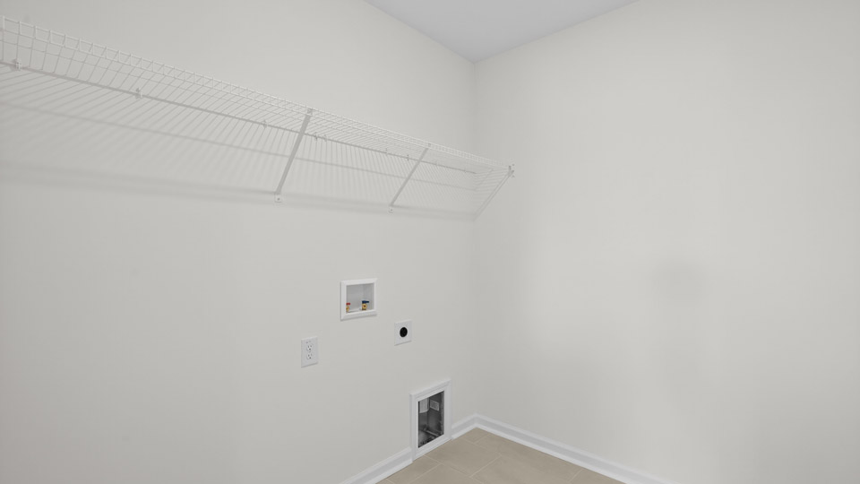 laundry room with wire shelving
