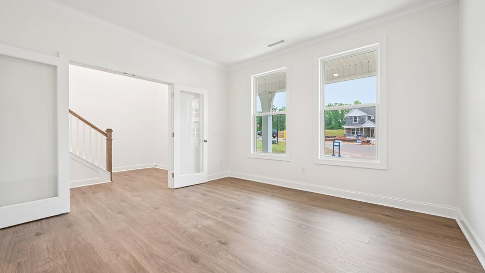 flex room with large windows, french doors