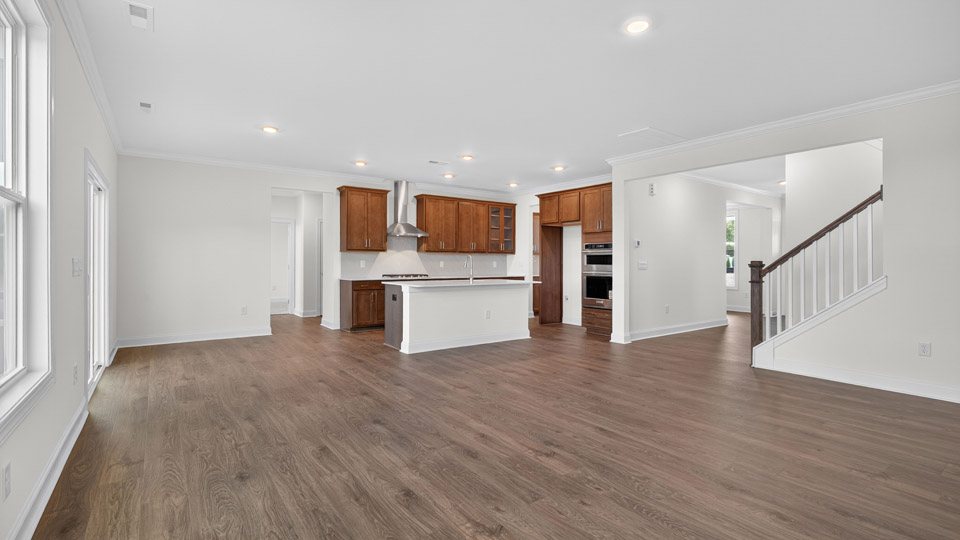 kitchen overlooking living room with revwood flooring