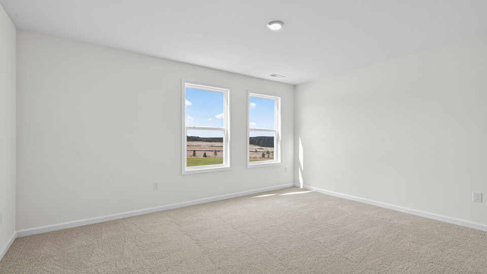 loft with carpet flooring