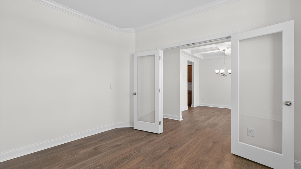 study with revwood flooring and french doors