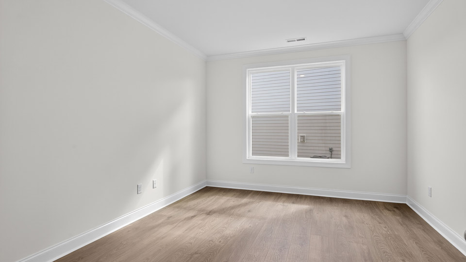 loft with carpet flooring