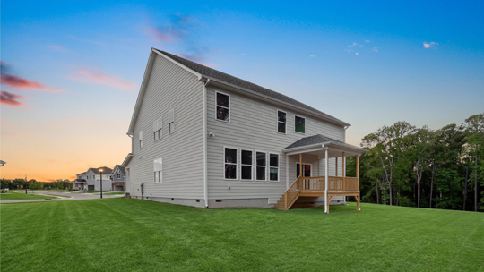 wylie backyard with covered back deck at twilight