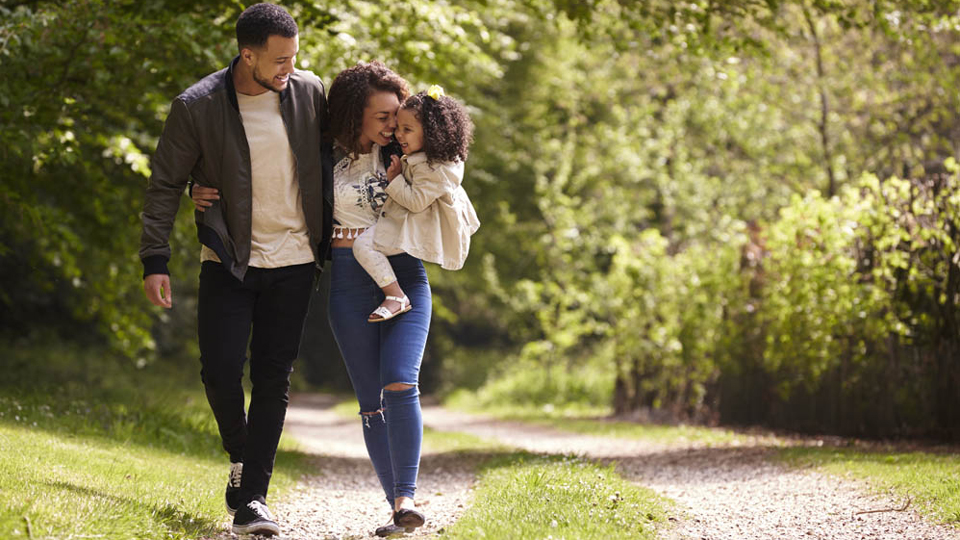 young couple walking on trail