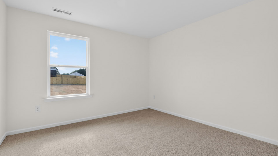 Bedroom with carpet floor and closet