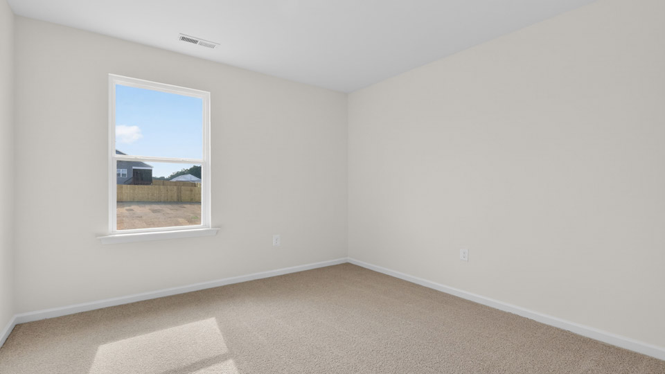 Bedroom with carpet floor and closet