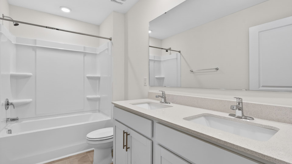 Bathroom with sink and tub