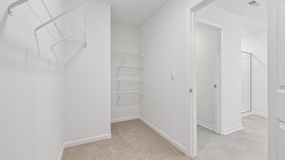 walkin closet with wire shelving
