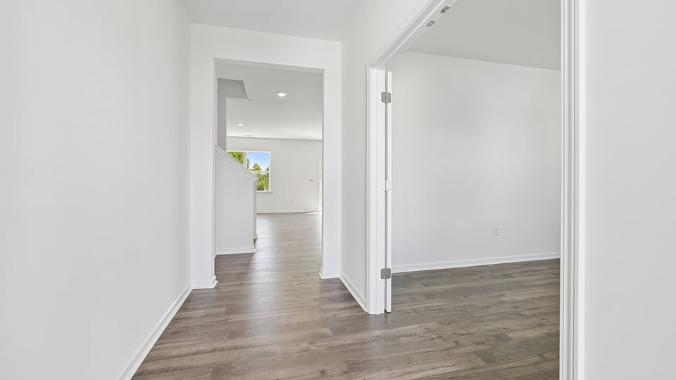foyer entryway with revwood flooring