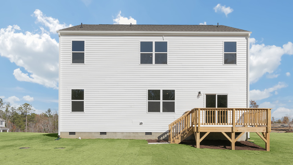 back exterior Hayden K with deck and open yard