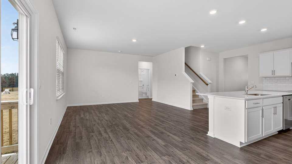 open concept living space with large windows
