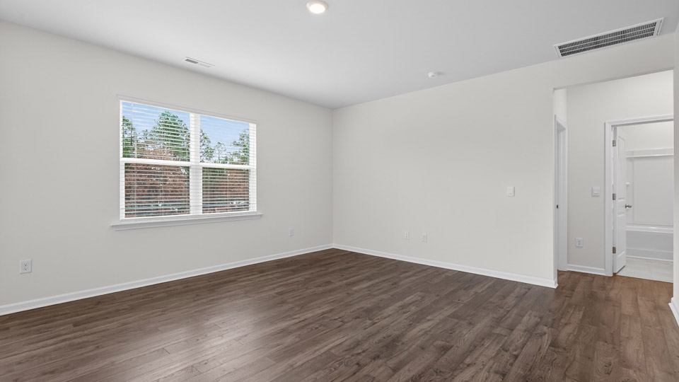 open concept living space with large windows