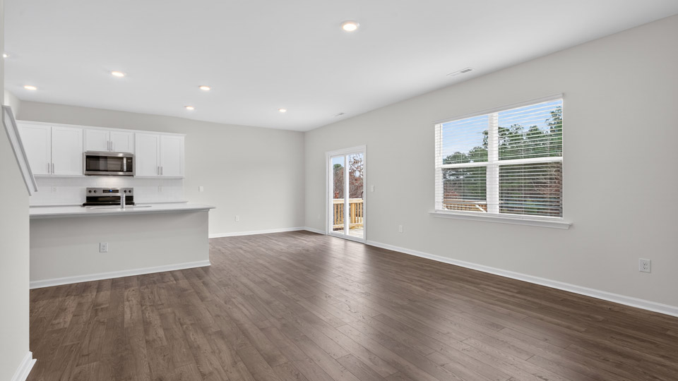 open concept living space with large windows