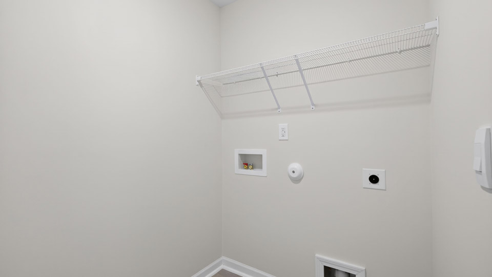 laundry room with wire shelving