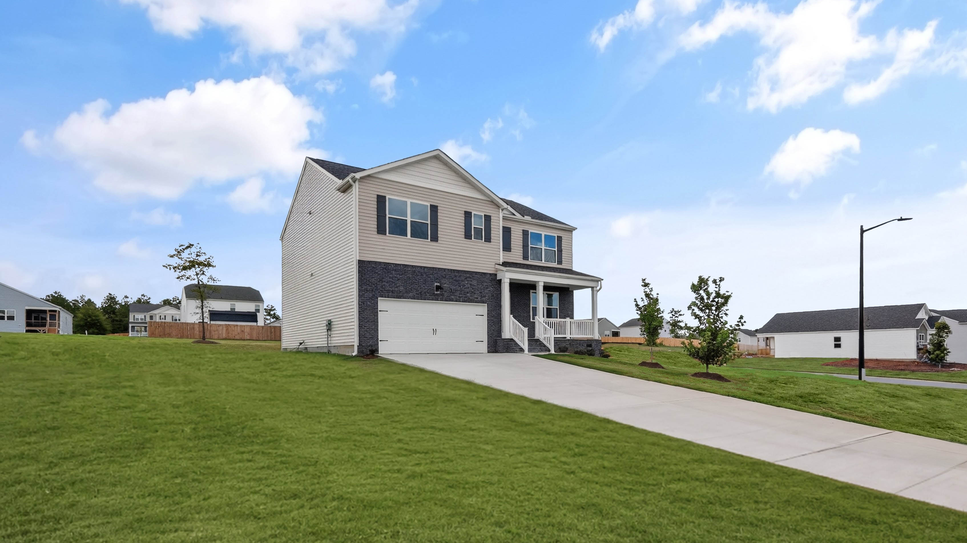 front exterior Hayden F with 2 car garage