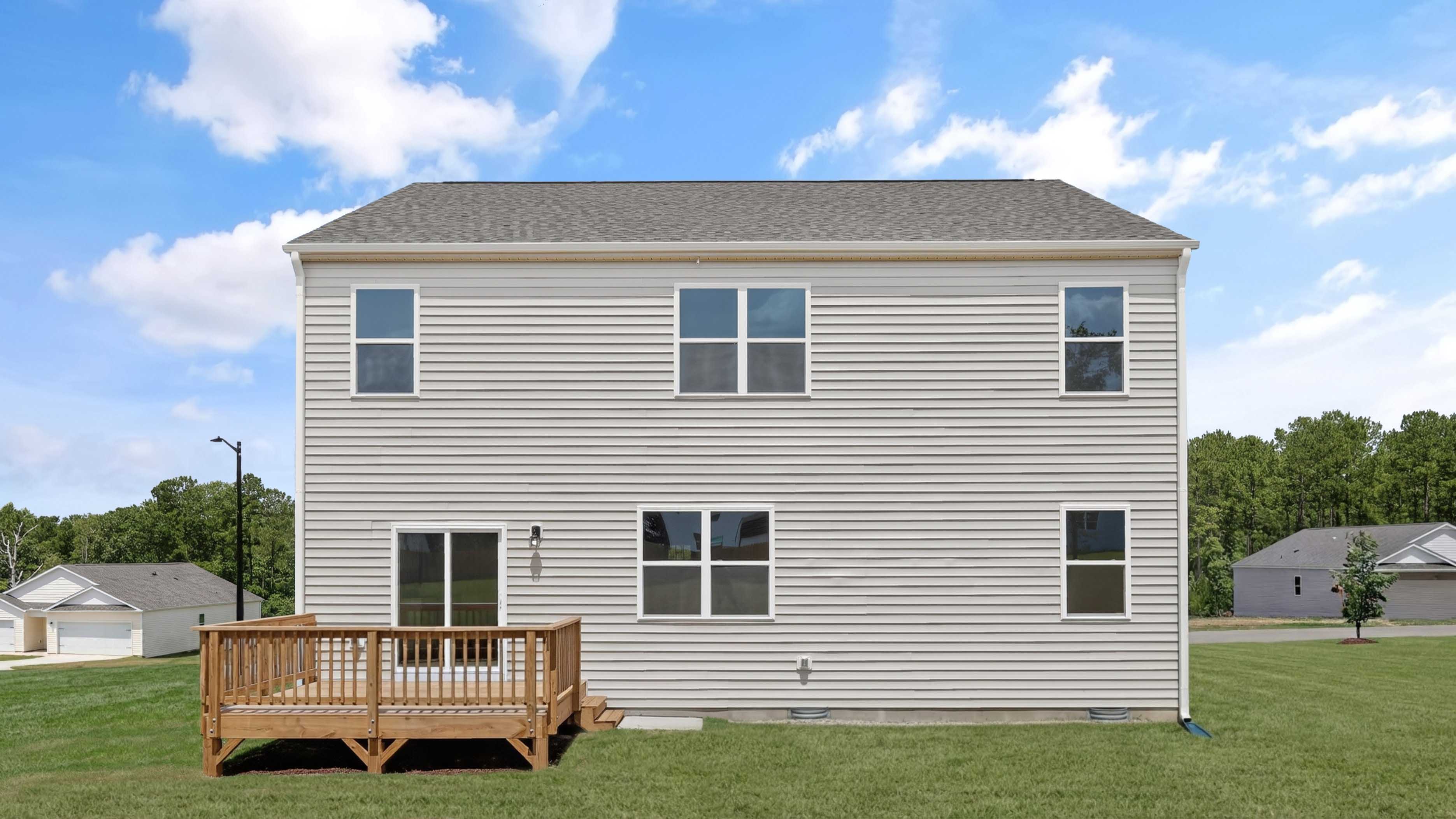 back exterior of Hayden with deck and open yard