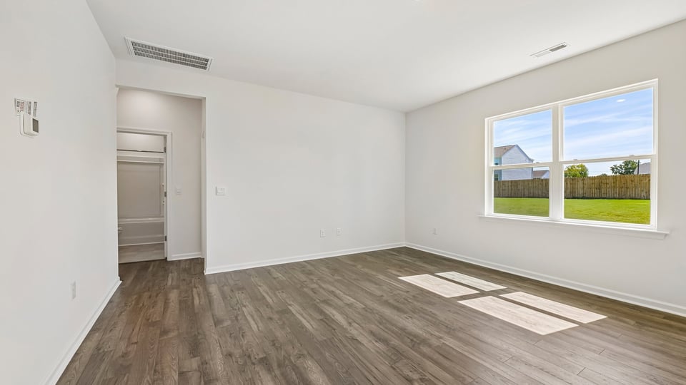 living room with revwood flooring