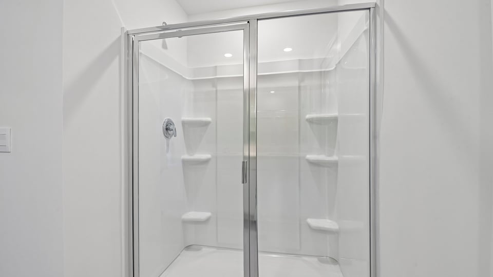 bathroom with walkin shower