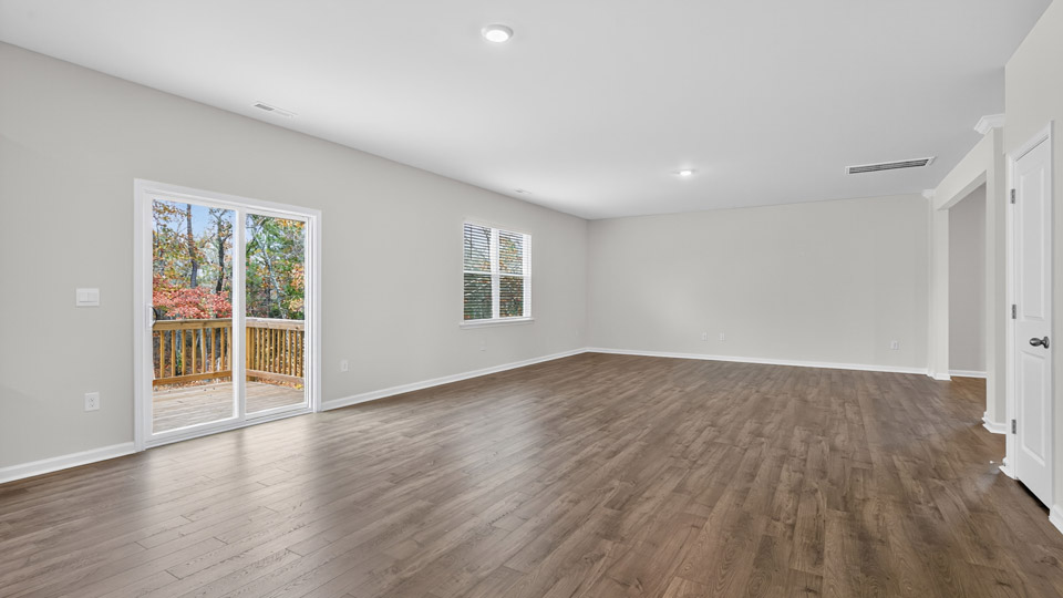open concept living space with large windows