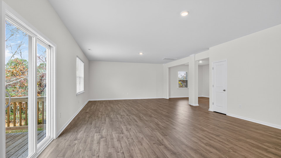 open concept living space with large windows