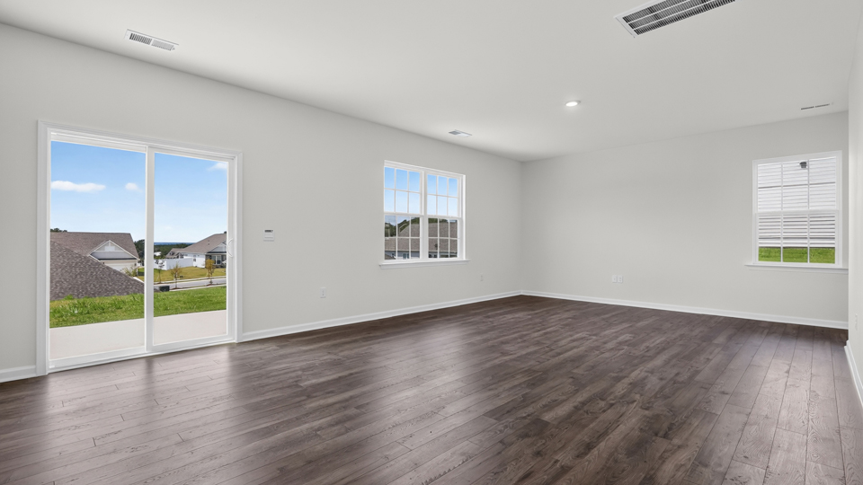 open concept living space with large windows