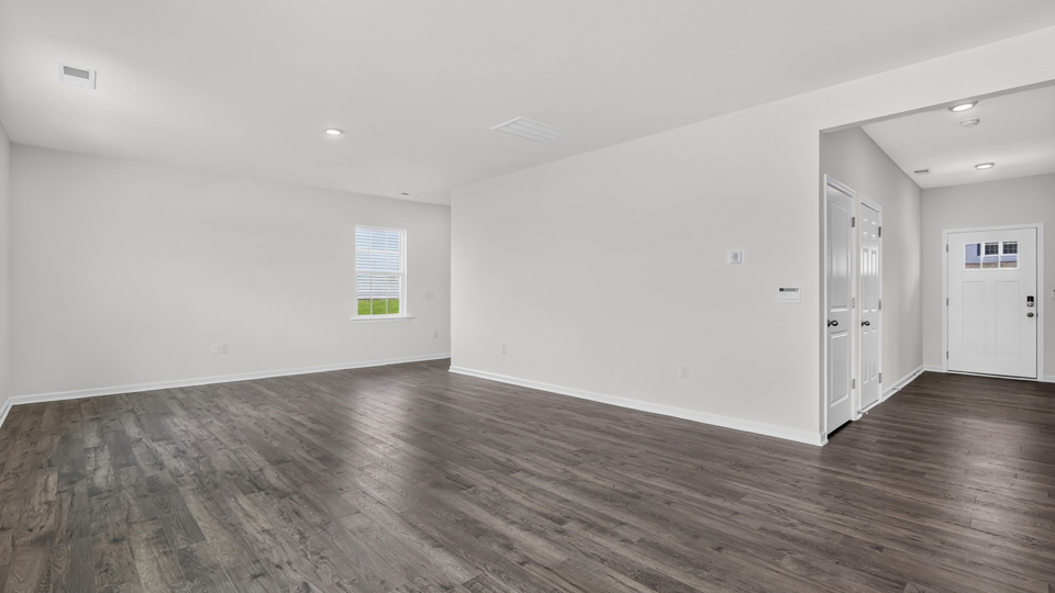 open concept living space with large windows