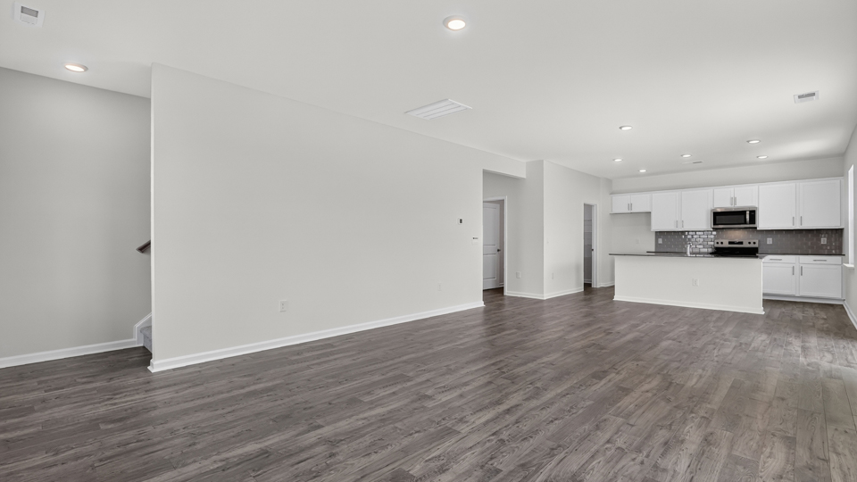 open concept living space with large windows