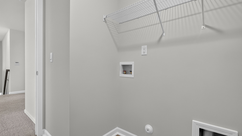 laundry room with wire shelving