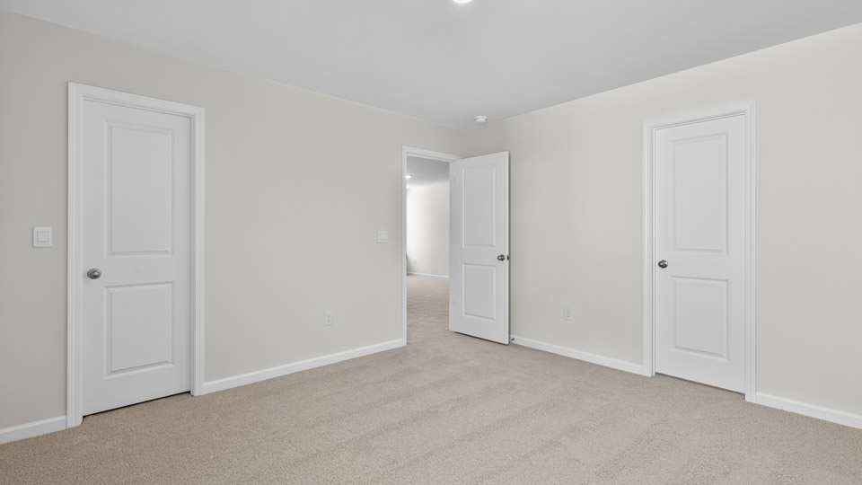 Bedroom with carpet floor and closet