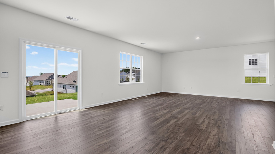 open concept living space with large windows