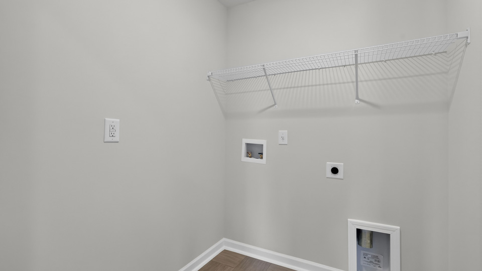 laundry room with wire shelving