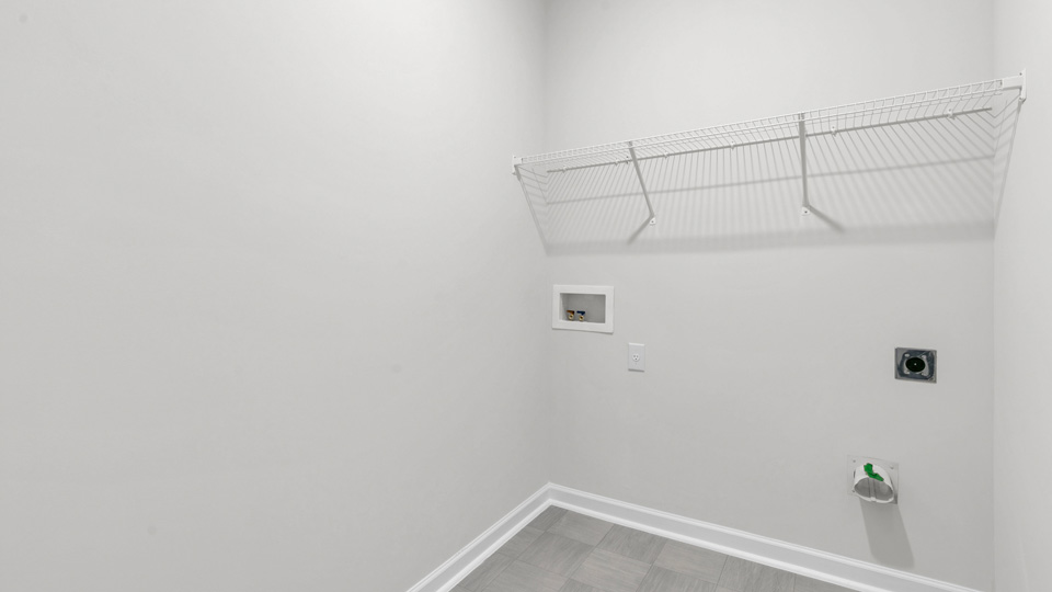 laundry room with wire shelving