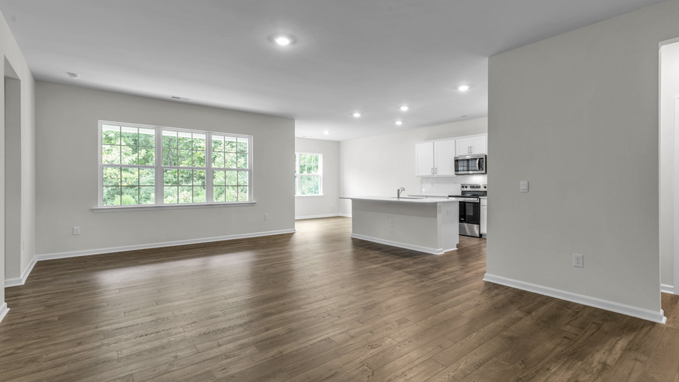 open concept living space with large windows