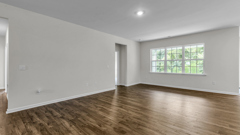open concept living space with large windows